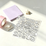 Minimal flat lay of cute bunny clear sticker sheet, stationery decor | Giftsmill